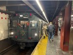 The first trip of the NYCTA Holiday Train stopped at 34th St-Herald Square Station heading northbound to 96th St 